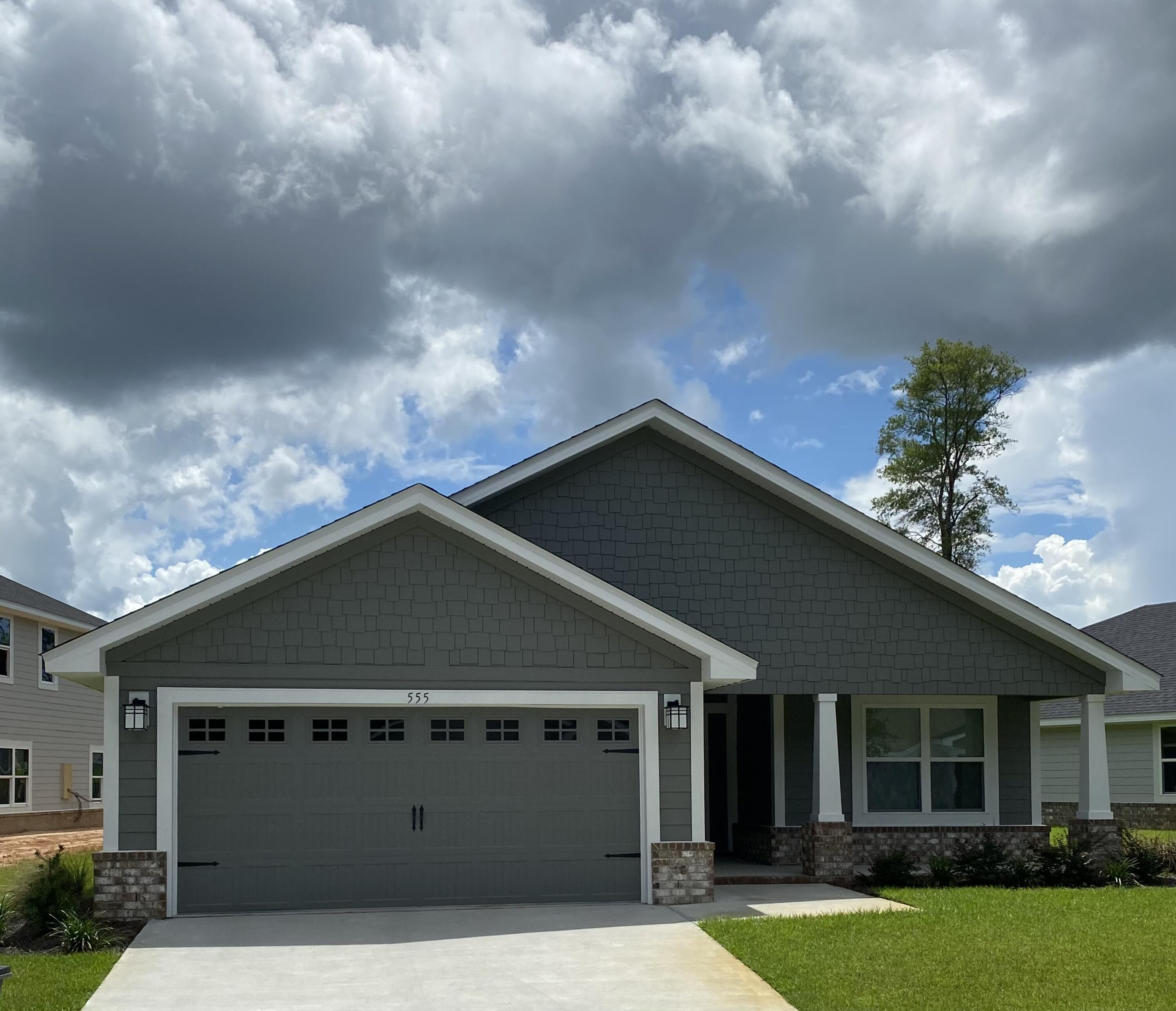 New community of Riverwalk located just 1/3 mile south of Freeport Publix off Hwy 331. Just a 15 minute drive to South Walton beaches! Popular Craftsman 4 BR/2 BA home with Hardiboard siding and brick skirt. Interior features 9' ceilings throughout, 8' entry doors, granite countertops in kitchen and baths, and durable Cortec Pro Plus vinyl plank flooring throughout. Trey ceiling in master with a large walk in closet. Master Bath has garden tub and shower. Seller pays most closing costs with approved lenders. Community pool and clubhouse to be built by Developer.