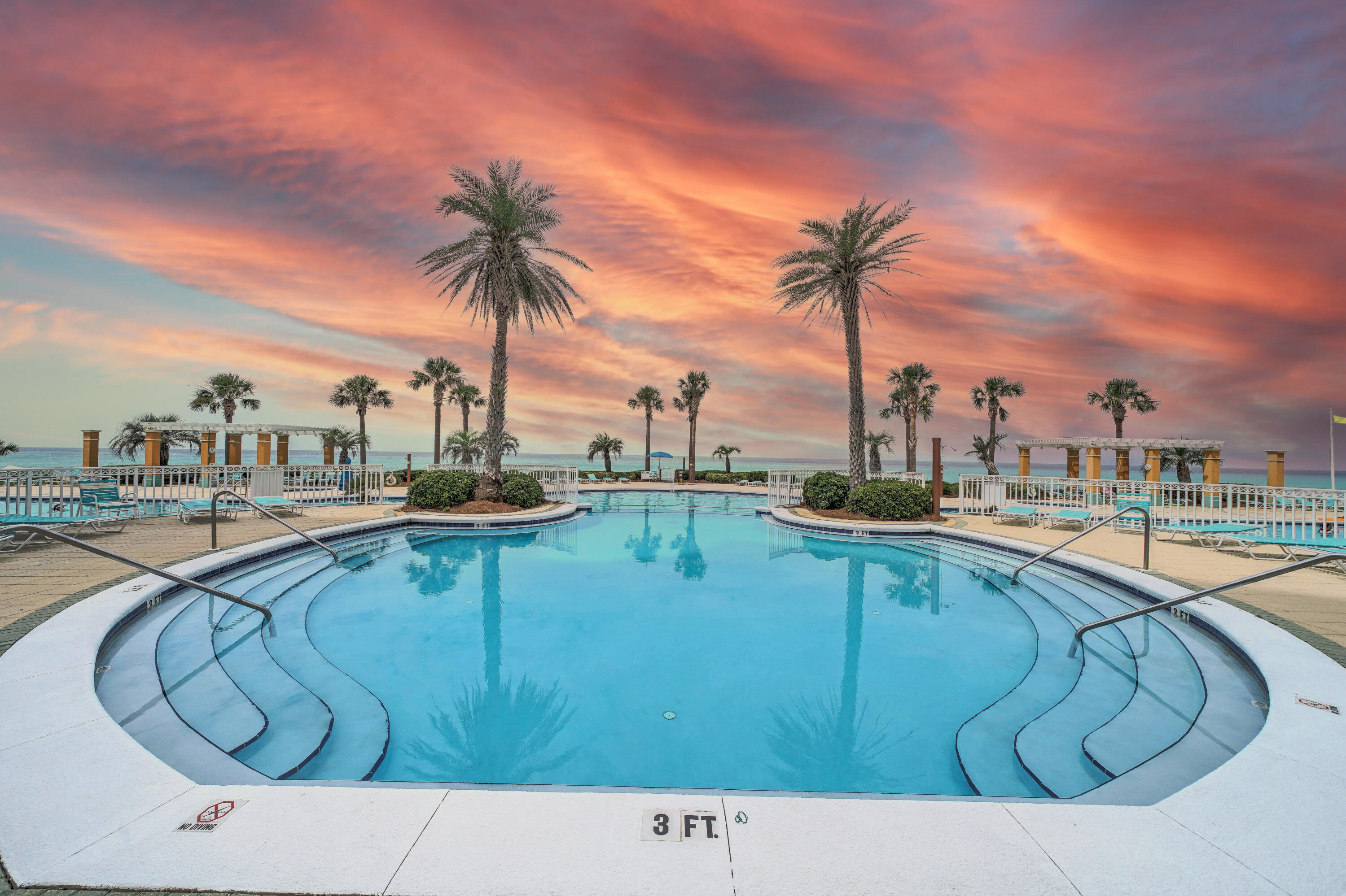 Highly regarded Penthouse in En Soleil. Charming French Country meets Coastal Living. Over 3000 ft. 4 bed / 4 bath with bonus room/office. 3 Master En Suites showcasing our Most Beautiful Beaches. Exclusive ground floor 1700 ft. private gated patio deck with 16 x10 private pool. Deeded parking space in underground garage convenient to the elevator. Schedule a private tour today! Gated Community with 24 hr. security.