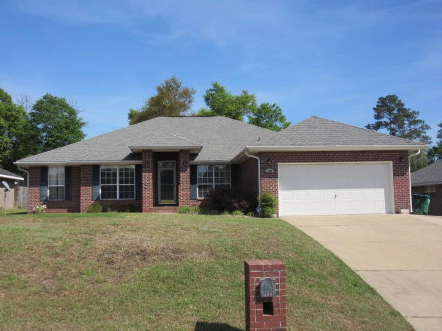 Priced right and move in ready. Large home on a great lot with easy commute to Duke, Eglin or Hurlburt. Split bedroom floor plan is separated by a extra large living area, great for entertaining. Whether it's in the family room, kitchen, formal living room or dining room, you have plenty of room to move around. Formal living room would make a great media room, game room or man-cave since it has double doors to close it off. There's plenty of storage inside and out. Large closets, plenty of kitchen cabinets, storage in the laundry room and garage, not to mention the large yard building with electric. Come see this home before it's gone.