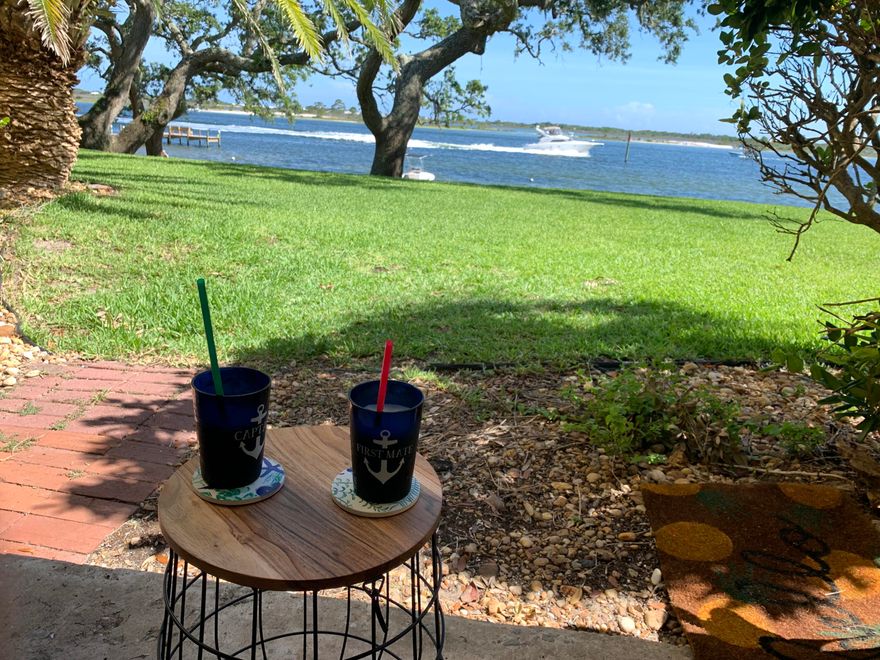 Waterfront condo on the sound. Income producing Vacation Rental but can be used as long term rental or owner occupied. Look right at the water from the living room  !  Ground floor unit with tile throughout. Enjoy waterfront living with fishing dock, pool and kayak storage on the water; utilities included in the HOA fee are: water, sewer, lawn and pool maintenance, professional management and complex insurance. Owner/Agent.
