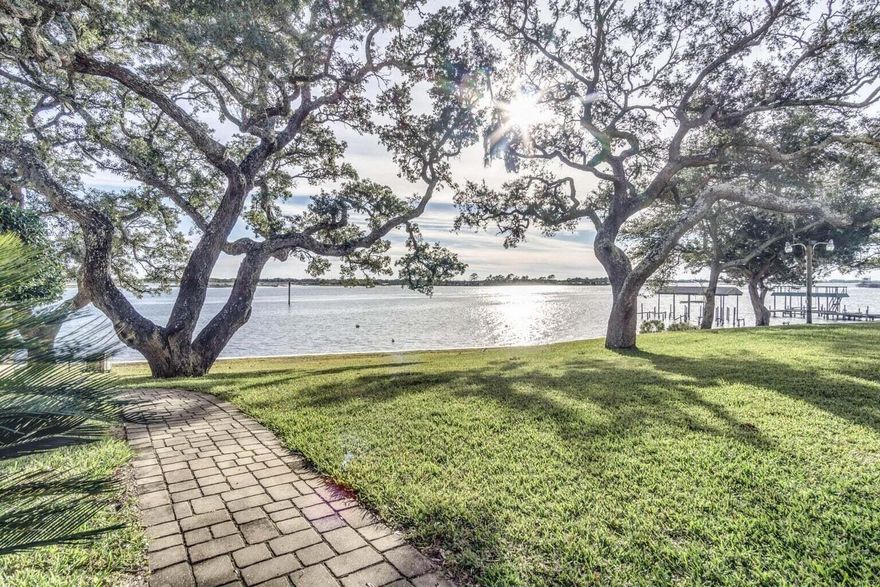 Enjoy your little piece of paradise at The Ceder's! Waterfront Florida living at a great price! You'll have access to a beautiful pool, private beach, boat dock, BBQ grills, kayak racks and a serene courtyard all situated in a wonderful location just minutes from the bases, and the beautiful beaches of the Gulf of America and shopping. This is a great opportunity to call home OR your home away from home. Fully furnished and allows STR.