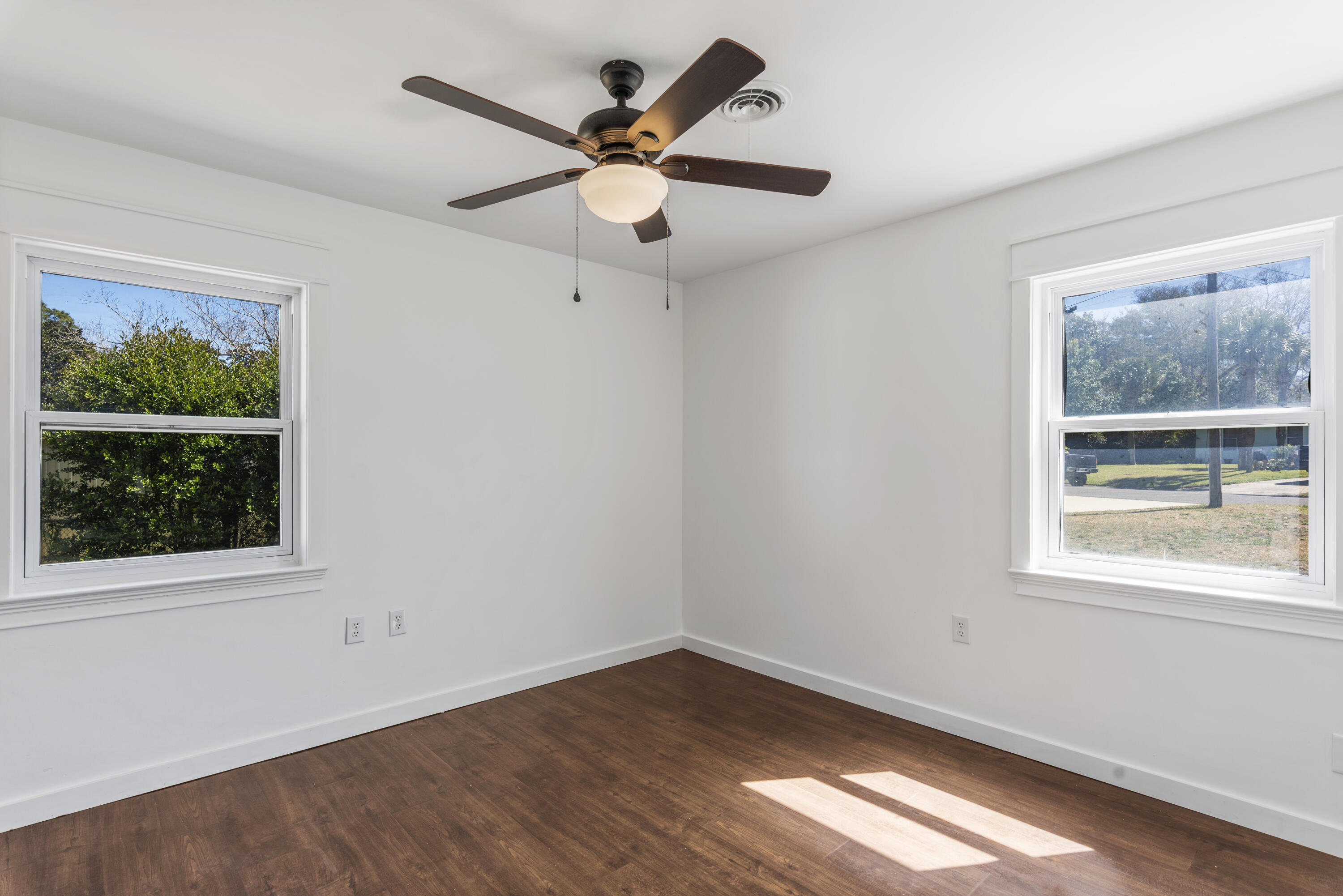 Completely renovated, inside and out, beautiful, brick house, sitting on a large, corner, lot in the sought after neighborhood of Bayou Woods. This home features a brand new kitchen with stainless steel appliances, shaker-style soft close cabinets, quartz countertops, and a subway tile backsplash. Shiplap compliments the walls in the dining room, with Waterproof, laminate flooring in a gorgeous Auburn, scraped oak shade. Both bathrooms are tiled throughout, with vanities, and the Master bath features a walk-in shower. All new electrical, plumbing, roof(2022) and HVAC(2022). Fenced in back yard, tool shed, and covered patio area, which can double as a carport if fence is moved. Located in a desirable neighborhood with no homeowner's association.