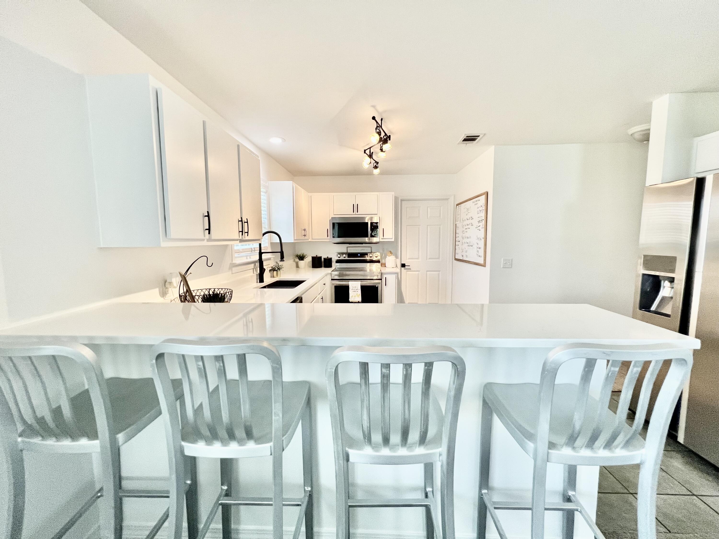 Florida Cottage, NO HOA, Short Term Rental allowed!!!! Just under 5 miles to the beautiful white sandy beaches on the gulf. Move in ready home that has been updated with new metal roof in 2021, windows, door hardware, bathroom fixtures, and just Freshly painted throughout. Kitchen has quartz countertops and stainless steel appliances and has been freshly painted. This home offers open concept so that you can see from the family room, dining area into the kitchen. HVAC installed 2018. Master bedroom has its own door to the back porch. Huge backyard and large porch for entertaining. Great location! Just under 5 miles to the beautiful white sandy beaches on the gulf. Less than 2 miles to hospital as well as lots of restaurants and shopping.