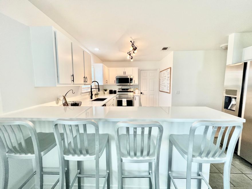 Florida Cottage, NO HOA, Short Term Rental allowed!!!!  Just under 5 miles to the beautiful white sandy beaches on the gulf.  Move in ready home that has been updated with new metal roof in 2021, windows, door hardware, bathroom fixtures, and just Freshly painted throughout.  Kitchen has quartz countertops and stainless steel appliances and has been freshly painted.  This home offers open concept so that you can see from the family room, dining area into the kitchen.   HVAC installed 2018.  Master bedroom has its own door to the back porch.  Huge backyard and large porch for entertaining.   Great location!  Just under 5 miles to the beautiful white sandy beaches on the gulf.   Less than 2 miles to hospital as well as lots of restaurants and shopping.