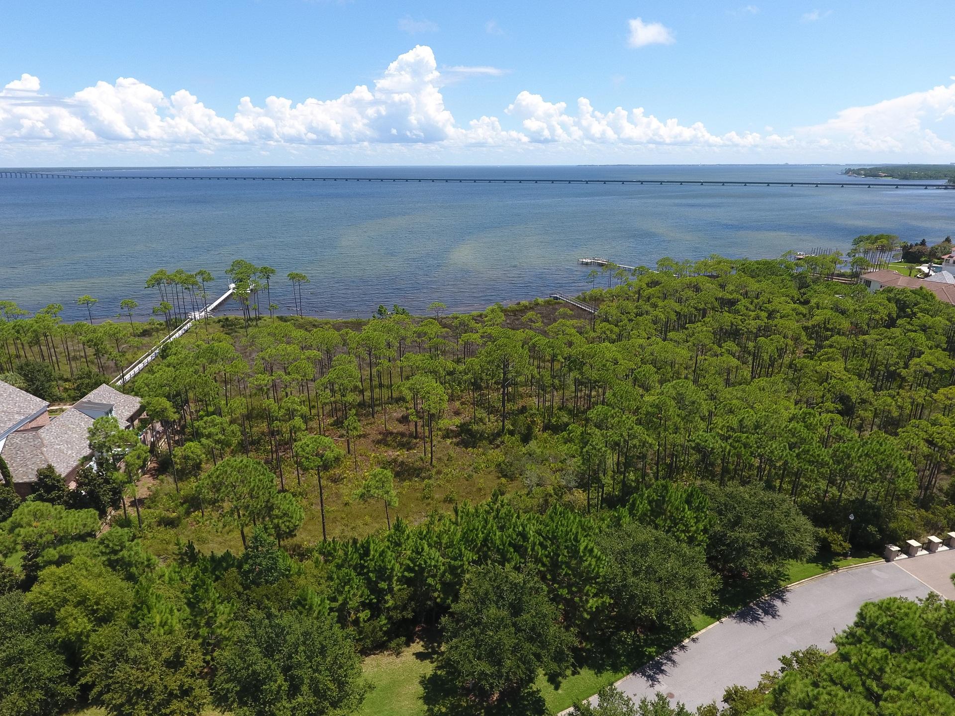 Unbelievable views from this glorious bayfront homesite located in prestigeous Waterford at Kelly Plantation. Bring your plans for your waterfront home because this is the ideal location. With the size and depth this homesite can accommodate almost any size home and the views are incredible. Once here enjoy the lifestyle Kelly Plantation affords: Fred Couples golf, beautiful clubhouse, pool area, tennis, workout room and more. Kelly Plantation is a gated community offering all of the amenities and charm you are looking for.