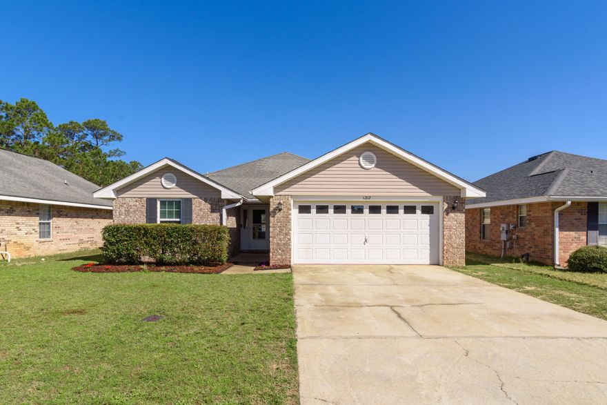 Located in the community of Grand Ridge and walkable to Oriole Beach Elementary, this 4 bedroom 2 bathroom home offers an open floor plan with vaulted ceilings and an awesome backyard oasis! The gunite saltwater pool is heated and features 2 waterfalls and 2 seating shelves. You'll enjoy the open deck space with a covered pergola that comes equipped with electricity, fan and the beautiful pavers encompassing the pool. Inside, you'll find new luxury vinyl flooring throughout the entire home and a split floorplan allowing privacy for the master suite. The master suite features a walk-in closet, and the spacious bathroom has a shower/tub combo with a double vanity and a linen closet. The 3 additional rooms are located on the opposite side of the house. The second bathroom is nicely updated wi