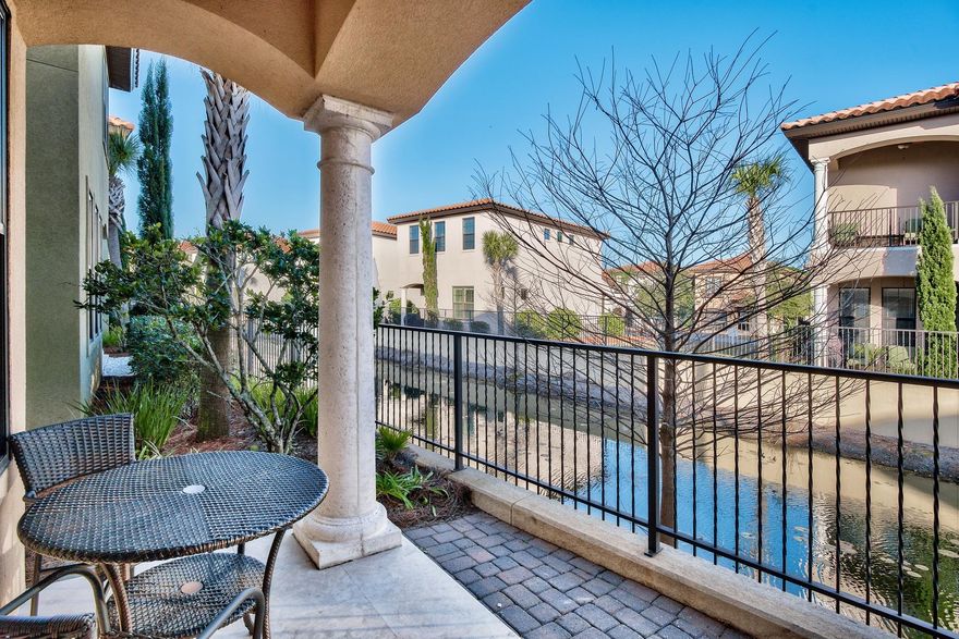 This Villa Lago home completed in 2013 is situated inside the gates of Sandestin Beach and Golf Resort. Travertine floors stretch from the inviting entry foyer to the window-lined great room overlooking the pond at the rear of the home. The kitchen capably hosts gatherings with an expansive island that accommodates bar seating for five. Sleek granite counters and stainless steel appliances tie the rich shaker style cabinets and unique glass back splash together. The first floor also features a guest bedroom and ensuite bathroom as well as an additional full bathroom. The spacious 2nd floor master bedroom captures water views that can also be enjoyed from the master sitting area.