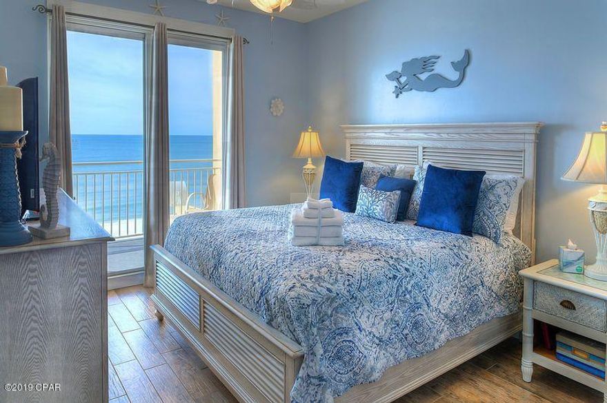 Fantastic opportunity to own this beautiful newly decorated 2nd floor Gulf front condo. Nothing for you to do except move in and enjoy! Great beach and sunset views from the balcony, living room & Gulf front Master bedroom. All new interior decor with porcelain wood-like tile throughout, easy to maintain, no carpet, all new living room furniture, new Master bedroom suite, mattress, box spring & bedding, new dishwasher & refrigerator in 2019, new water heater & garbage disposal in 2018, freshly painted throughout, newly refinished white cabinets in kitchen & bathrooms. 3 owners closets including one inside Master bedroom closet. Located close to County Pier, Shipwreck Island Water Park & Alf Coleman Rd with easy access to Front & Back Bch Rd. Perfect home or Vacation rental. Call today!