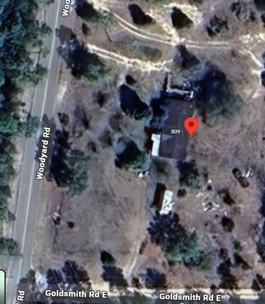 Fixer upper on 2 acres in great DeFuniak location.