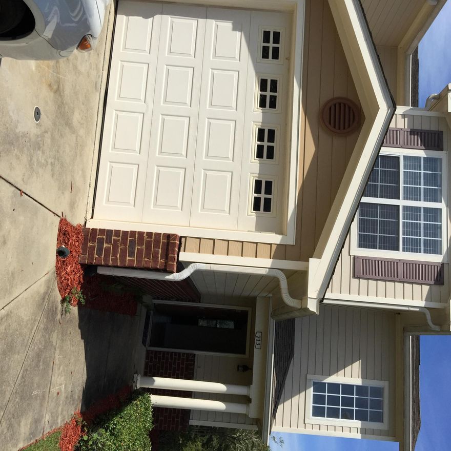 The well developed town home community consists of a nature preservation area with nature trails,a gazebo,and an overlook pavillion. Cool down after a long day at work by the community pool with deck and changing rooms. This location south of I-10 makes for a convenient drive to area beaches and military bases. This is a two story traditional design with brick and Hardy plank exterior. The floor plan has the living and kitchen downstairs and bed rooms up stairs. The garage makes a great way to keep you dry in the rain. Inside the tile floors large molding and whirlpool appliances will be in place for years of service.