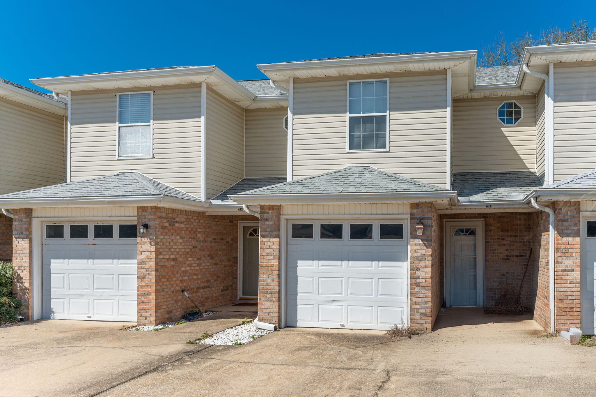 AVAILABLE NOW!!! TWO OWNER'S SUITES! 2 bedroom, 2.5 bath located within close proximity to Hurlburt Field and the area's beautiful beaches. The main floor offers an open-concept plan with the kitchen overlooking the large living area, breakfast bar, stainless appliances in the kitchen, and a half bath. The upstairs offers 2 large bedrooms with private en-suite baths and large closets. The backyard has a privacy fence to offer more solitude.NO smoking. 600 minimum FICO credit score is required in addition to meeting rental criteria. Dogs are allowed upon approval with a non-refundable pet fee and with a Petscreening.com report. NO CATS! Applicants with an ESA are also required to complete the application.