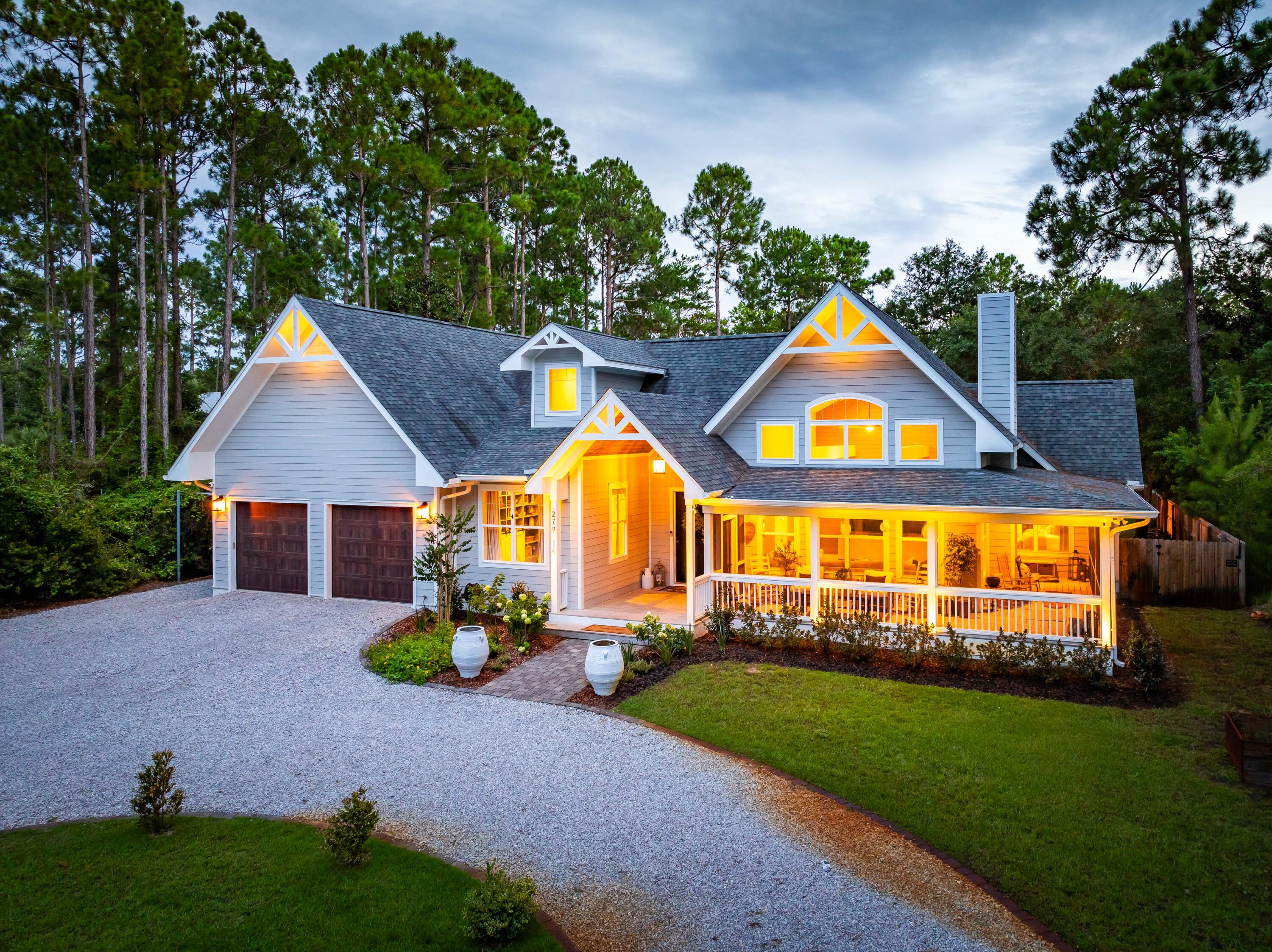 Immerse yourself in tranquility moments from the beaches of Scenic Highway 30A. This custom-built 4-bedroom,4-bathroom haven in the coveted Point Washington community is close to South Walton schools and centrally located to restaurants and shopping along 30A. The master suite features a luxurious vaulted ceiling and a dedicated sitting area, perfect for unwinding with a good book. Step outside the fully equipped kitchen with gas range and walkin pantry to your own private oasis - a screened porch with an outdoor kitchen seamlessly transitions to a sparkling resort-style pool and spa complete with a waterfall. The perfect place to entertain family and friends amidst the expansive half-acre lot.