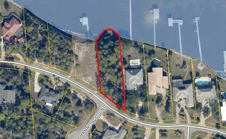 Enjoy panoramic bay views from this exceptional bar front lot in the desirable gated golf course community of Emerald Bay. This beautiful lot features 120 feet of water frontage with a point edging out into the bay. Riprap is in place. There's plenty of room for a spacious home, pool and outdoor living area, and have a private dock for your water toys! There aren't many bay front lots left...don't let this opportunity pass you by! HOA fees are $185 per quarter and $60 per quarter for vacant lot maintenance. As always, all dimensions and fees important to the buyer should be verified.