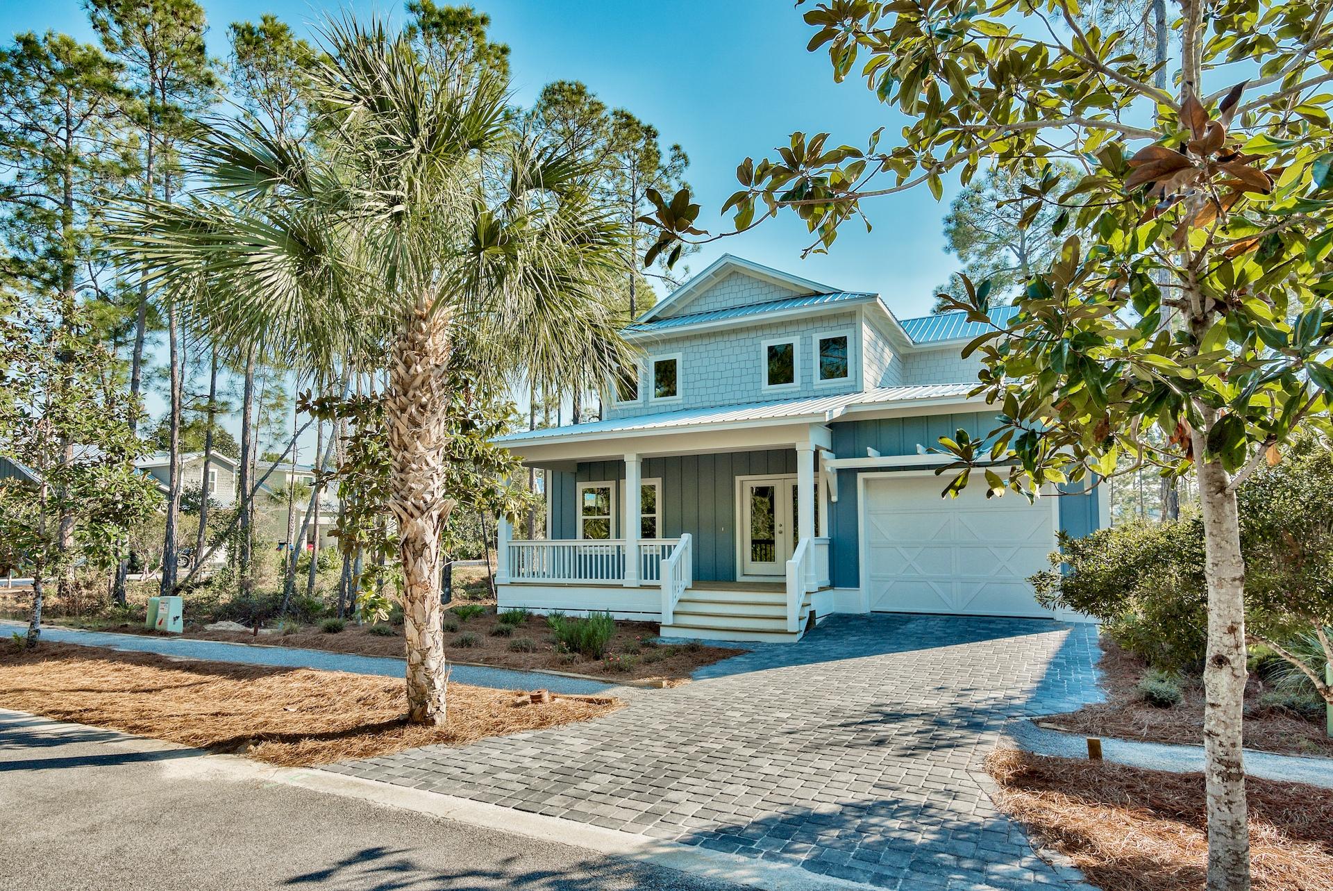 Brand new construction custom home just completed in the gated Santa Rosa Beach community of Hidden Grove! SELLER WILL PRE-PAY HOA DUES THROUGH THE END OF 2018. Built by a high quality local builder, some of this home's features include white-washed tounge and groove wood ceilings, cottage style crown molding, engineered wood flooring, leathered quartz counters, stainless steel appliances, exhaust hood over stove, custom cabinetry, kitchen backsplash with matte white subway tiles in a herringbone pattern, custom wood walk-in pantry and closets, satin nickel finishes, LED recessed lighting, HUGE custom walk-in tiled master shower with dual shower heads, master bath backsplash with matte gray subway tiles, custom wood framed mirrors in the full baths, and lots of natural light with a great