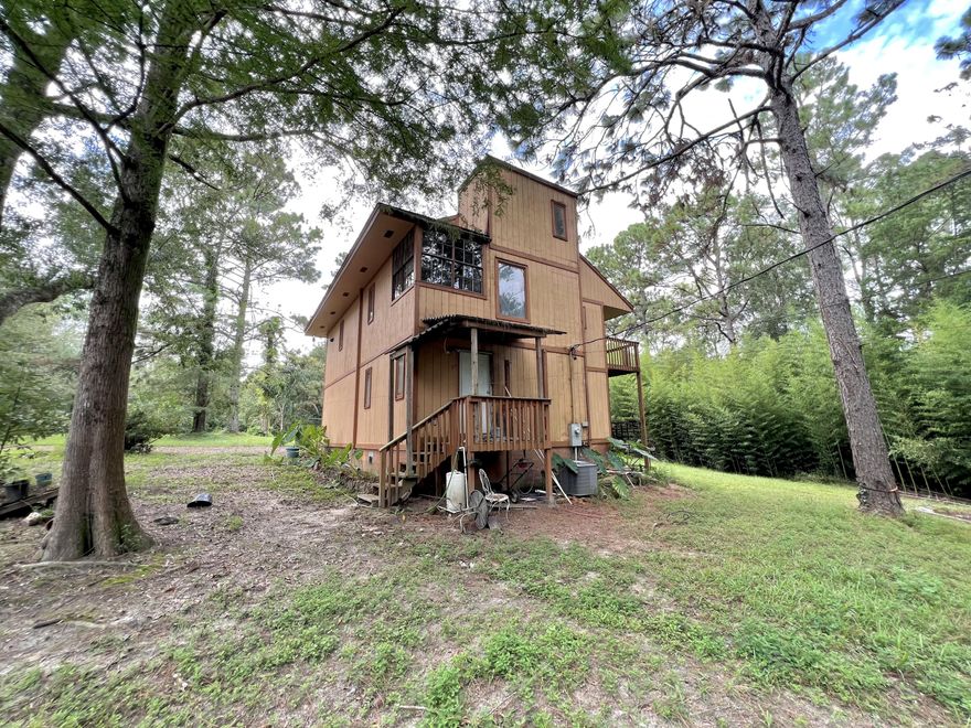 INVESTOR special! This could be your next flip! Centrally located in Cantonment this property is being sold AS-IS. So much potential here! Buyer to verify ALL measurements. Tax records also has the effective year of 2000.