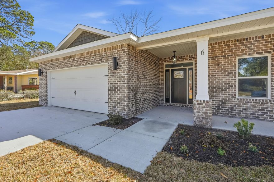 $10,000 in Anyway Money! Brand-new construction east of Hurlburt featuring 5 bedrooms, 3 baths, + bonus room/office off the primary suite. Expansive open concept with LVP flooring, double pantry, large island, and dining area flows seamlessly into a spacious living room. Enjoy an all-brick exterior, craftsman trim, epoxy garage floor, soft-close cabinets, stylish lighting, and mirrors. The primary suite is a true retreat, showcasing a double vanity, tiled shower, garden tub, private water closet, and generous walk-in closet.Large, privately fenced backyard. Nestled in a mature community with sidewalk-lined streets.Additional peace of mind includes a 1-year builder warranty and termite bond.