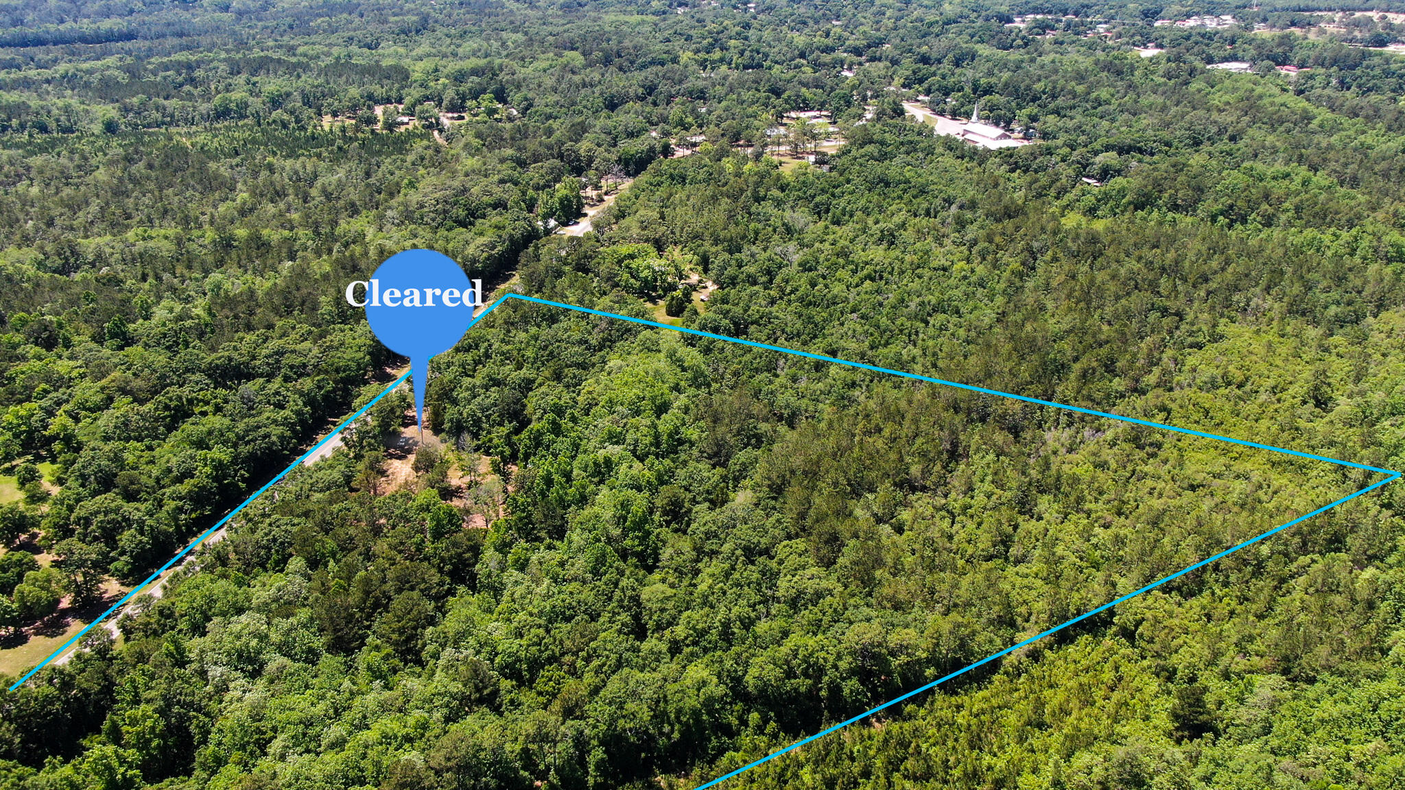 Rare, amazing opportunity to own 9.5 lush acres that feels like the country and yet, is just inside the city limits on a paved road. Mature trees with a secluded homesite already cleared and ready for your new build. Lot is mostly level and would make a fantastic building site. Subject to City of DeFuniak restrictions; there are no manufactured homes allowed in the city limits. Only 30 minutes to the beaches and 5-7 minutes to shopping, Hwy 331 and I-10.