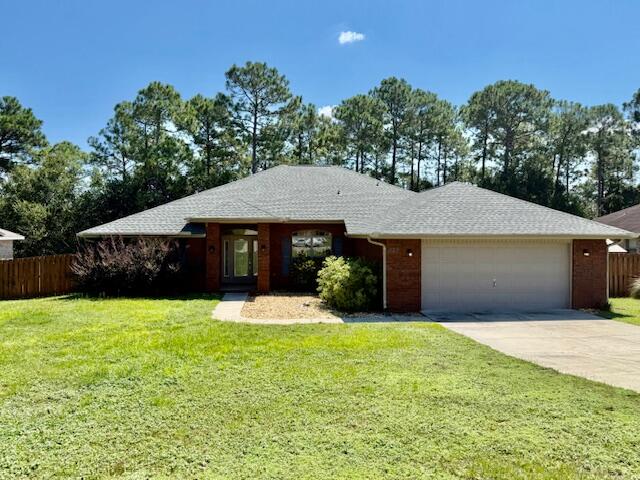 AVAIL: 9/24. S/D = $2,500, can be broken up in 2 monthly installments, if qualified. PETS ALLOWED UPON APPROVAL & W/ A PET FEE! Welcome to this stunning South Crestview single-story property for rent! This all-brick home boasts a covered front entrance, an open floor plan w/ 4 spacious bedrooms, each featuring cozy carpeting & 3 full bathrooms. The master suite is a true retreat w/ double vanity sinks, 2 walk-in closets, a garden tub & a separate shower. The tray ceiling in the master bedroom adds an extra touch of elegance. The large kitchen includes stainless steel appliances, a breakfast bar & a large pantry for all your storage needs. The home also features a bonus room, perfect for a home office or playroom. The inside utility room adds convenience, while the 2-car garage w/ an auto opener provides ample parking. Enjoy the Florida weather on the open back patio or the covered back section. The large privacy-fenced backyard is perfect for outdoor activities & the yard building offers additional storage. This home is all electric w/ LVP flooring throughout the main living areas. Come & experience the comfort & convenience of this beautiful property! Sorry, no smoking allowed.