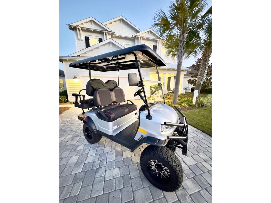 The included golf cart allows instant access to everything that defines the NatureWalk at Watersound Origins lifestyle--community pools, the fitness center, the Origins golf course, Lake Powell, and nearby shopping and restaurants. It creates an easy, car-free rhythm to daily living that families, guests, and second-home owners value.Inside, the home blends elegance with comfort. Upgraded trim, paneling, and a central fireplace anchor the main living area, while thoughtfully designed closets--including a boutique-style primary closet--keep life organized. Two games can be enjoyed at once in the home's two living spaces, and additional rivals can be watched steps away at the clubhouse on the multiple large screensideal for football weekends and bowl-season gatherings.

The screened-in lanai has plenty of space to share meals that linger into the evening and beckon family and friends to finish the night around the warmth and glow of the firepit. Elevated landscaping, custom shutters, a custom-painted front door, and an upgraded gas lantern further enhance the home's curb appeal.
Turnkey, furnished, and ready for immediate enjoyment, this home supports a lifestyle that is easy, comfortable, and perfectly suited for the season.


Highlights:

*Gated community in highly rated Walton County School District

*Expanded floor plan with thoughtful upgrades and design details

*Resort-style amenities: cabana-lined pool, pickleball & tennis courts, fitness center, and scenic trails

*Outdoor living perfected: screened lanai, outdoor kitchen, & fire-pit

*Timeless exterior design: gas lantern, working shutters, and curated plantings

*Oversized 2-car + garage with room for bikes, beach gear, and golf cart

*Prime location: golf-cart to Publix, dining, shops, and medical care in minutes

*Meticulously landscaped lot with mature plantings that bloom year-round

More than a home... 320 Nature Boulevard is where your coastal story begins.

