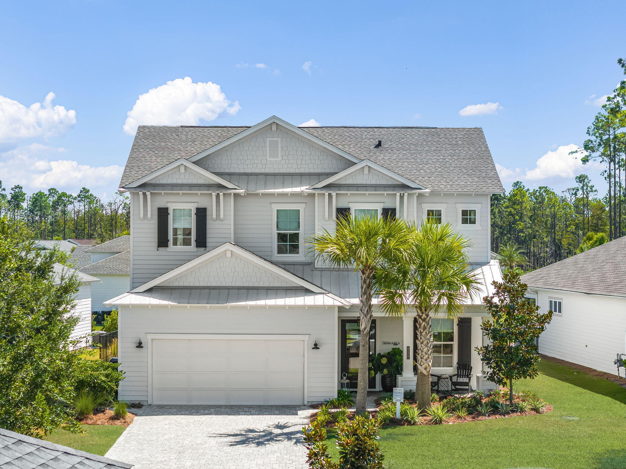 The only home with this expanded floor plan in the community, offering more square footage, room to grow, and updates inside and out. On one of the larger lots with French drains installed, it's ready for a future pool or cabana.Families will love the convenience--school bus pickup is steps from the porch, and the pool, tennis, pickle-ball, gym, and mailbox are steps away. Mature, low-maintenance landscaping leaves time to enjoy the coastal lifestyle while surrounded by year-round beauty. Located in the highly sought-after Phase I of Naturewalk at Watersound Origins, this home places you at the heart of a vibrant coastal community. Residents enjoy access to:
-A top 25 Par 3 golf course for players of all levels
-Resort-style amenities including a pool and fitness center
-Scenic nature trails for walking, biking, and exploration
-Fishing, paddle boarding, or kayaking on Lake Powell or the Gulf
-Proximity to 30A's pristine beaches, exceptional dining, and boutique shopping
-An upcoming world-class art museum just minutes away
Conveniently, the community's golf cart paths connect you to Publix, shops, dining, and more, allowing you to enjoy the area without ever needing to drive.
Unlike new builds, the property features mature, low-maintenance landscaping with seasonal blooms from hydrangeas, camellias, azaleas, roses, lilies, lantana, and pink pampas grass. Trellis-trained roses add charm, a Chaste tree conceals utilities, and three mature palms provide shade, privacy, and instant curb appeal. A curated oasis ready to enjoy from day one.
Sellers had plans for a pool and carriage drawn and area happy to share this with interested buyers. This is the perfect lot to create backyard pool oasis. Remember the home is only steps from the resort style pool and amenities of Naturewalk, so some may prefer to enjoy that and have the upkeep.