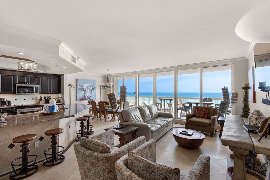This beautiful 6th floor condominium offers stunning Gulf views and luxurious finishes throughout. The main areas, including the living room, dining room, kitchen, hallways, and bathrooms, feature elegant travertine flooring. All three bedrooms are adorned with hardwood floors, adding warmth and character to the space. The three bathrooms have been meticulously renovated with travertine showers and upscale vanities. The master bathroom is particularly impressive, showcasing a seamless travertine shower, a whirlpool bath, and two separate mirrored vanities illuminated by unique lighting fixtures. The kitchen boasts faux-finished cabinets, stainless steel appliances--including a wine cooler--and granite countertops, providing both style and functionality... Additional conveniences include a spacious laundry room equipped with a sink and a back door that serves as a service entrance. St. Maarten is perfect as a fulltime residence, second home or a vacation rental. The buildings semi-private elevators open directly into the condo. Each unit has a deeded parking space in the garage and climate controlled storage unit. ALL utilities, even electricity, are included in the condo association fee. The Silver Shells Resort, located in the heart of Destin, provides every amenity imaginable including 24 hour gated and guarded entrance, cardio & weight rooms, 4 tennis courts, basketball court, grills and picnic area, a 7500sf lagoon pool, indoor/outdoor heated pool, several hot tubs, the Silver Shells Day Spa and Ruth's Chris Steakhouse. This 27 acre resort, with lots of greenspace, has over 1000 feet of beachfront, a Sand Bar on the beach serving food and drinks in season, and gorgeous sugar white sand beach and emerald green crystal clear water. This unit is ''move in ready''. Nothing needed to begin enjoying the ultimate in beachfront living immediately!