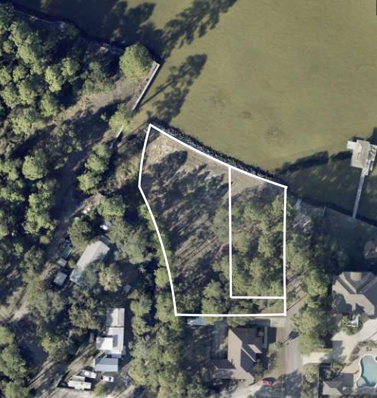 This is two substantial lots of Record recently platted to create a masterpiece development opportunity for two homes or two separate idealized structures in a familial compound estate with 210 feet of Bay Frontage.An opportunity to have two docks, two homes or any other imaginable setting for your family.