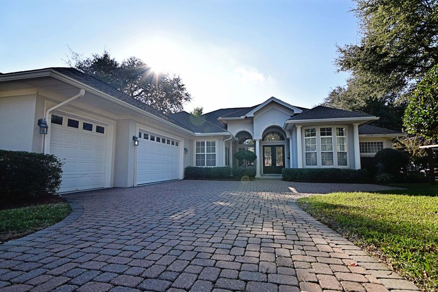 Experience comfortable Florida-living in this open and spacious executive-style home in Niceville's beautiful, family-friendly neighborhood, Swift Creek . This 3bed/3bath/3car-garage gem of a home can be found at the beginning of a quiet cul-de-sac with beautiful landscaping and cobblestone drive. Even before entering the home, you can't miss all the special details; birdbath, decorative metal work, and stand for porch swing. From the street, its large front door and windows certainly make a statement. Upon entering, you'll notice a large open living space with room for formal dining area and living room with decorative inlaid tile flooring and custom light fixtures throughout. Most noticeable are the windows and doors that frame a view of the beautiful