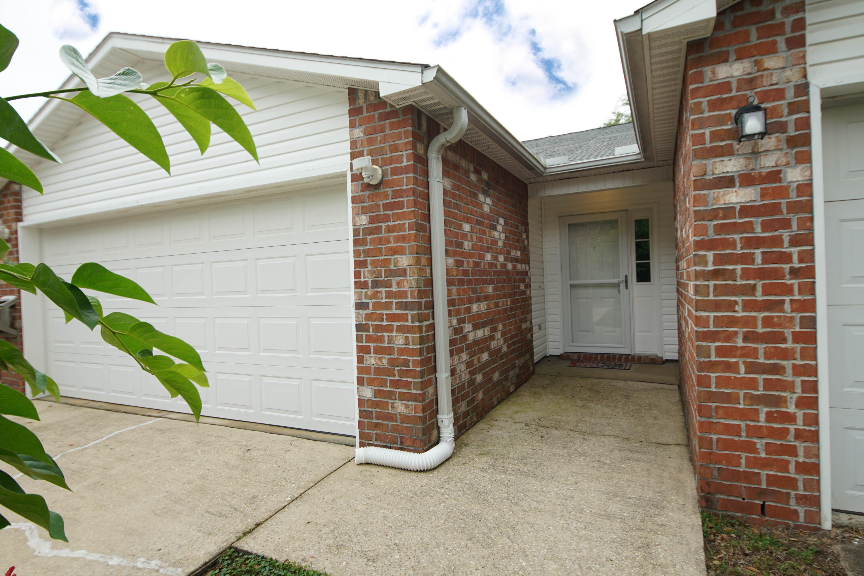 Seller offering home warranty up to $600.00! New updates: Just painted the bathrooms and bedrooms Sherwin Williams Greek Villa White, sodded back yard! One story townhome in the heart of Fort Walton, FL with 1180 sq ft and a 2 car-garage! This 2 bedroom/2 bath townhome is a perfect home or an INVESTMENT property! Built in 2005 yr there have been many upgrades to include a new roof in 2019, new hot water heater, new gorgeous flooring, updated custom kitchen cabinetry with quartzite countertops and a custom quartzite and tiled back splash! There is an undermount sink with a new kitchen faucet, and a French Door refrigerator (2020)! The bathrooms have many updates to include the vanities and faucets and fixtures. The garage floor has been painted and the garage opener has been replaced The primary bedroom is very large and has an ensuite bathroom and closet. There is a large walk in closet! The primary bathroom features a double vanity and large tub/shower combination. There are raised panel doors throughout. There is a covered patio and extended patio and fenced in back yard. This townhome is homesteaded so the new buyer will get the benefit of a lower tax rate in 2023. There is not a home owner's association and no flood insurance required! The home has two storm doors! This home is a rare opportunity in Fort Walton Beach! One story town homes are very desirable! Adding a dishwasher to kitchen cabinetry. This home is located close to beaches, schools, shopping, and the military bases! Buyer to verify all dimensions and information.