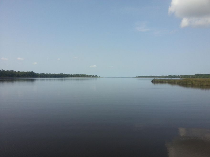 Fabulous view from this100' waterfront lot overlooking Alaqua Bayou and Choctawhatchee Bay. On a clear day you can see all the way to Sandestin. This three quarter acre property is perfect to build your dream home and dock in the desirable and well established Waterview Cove Subdivision. Live in old Florida style just minutes from the pristine white sand beaches of South Walton County and the amenities of 30-A.