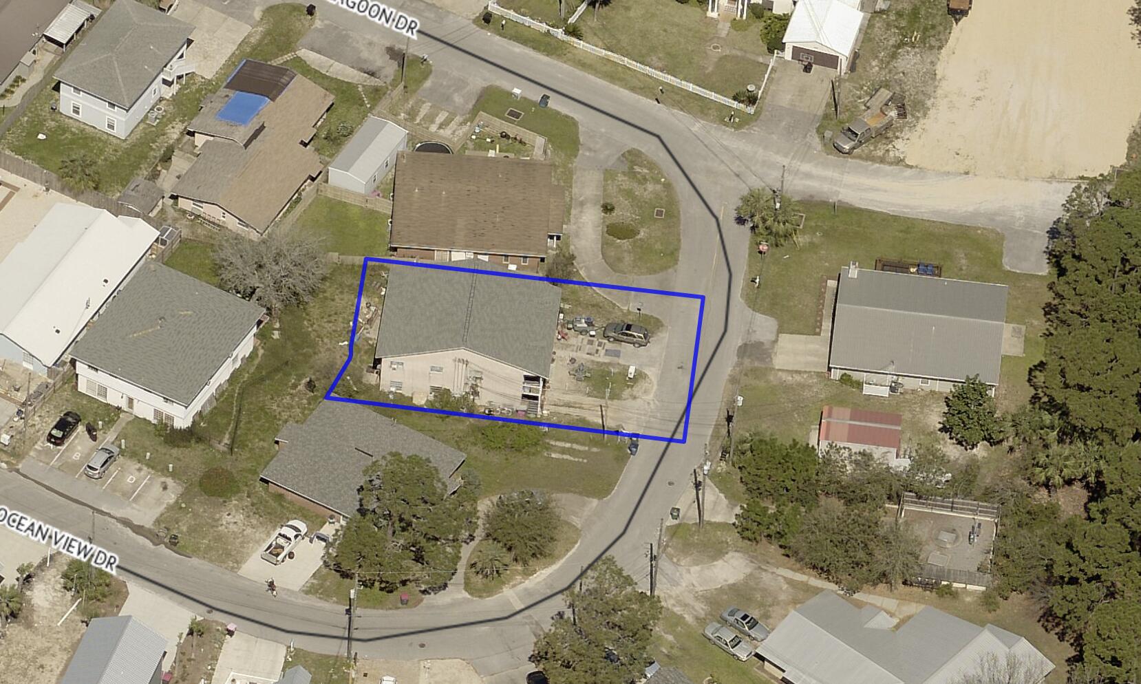 Panama City Beach two-story multifamily building with four units. Two units on each floor with each being two bedrooms and one bathroom for a total of eight bedrooms and four bathrooms. New roof in 2019. Perfectly located between Grand Lagoon and the Gulf of Mexico. This property is a lucrative investment property. Call for details. Public boat ramps, restaurants, groceries and St. Andrews State Park nearby. A property like this doesn't come along often. So much potential in a stellar location. Walk to the beach for sunrises and sunsets.