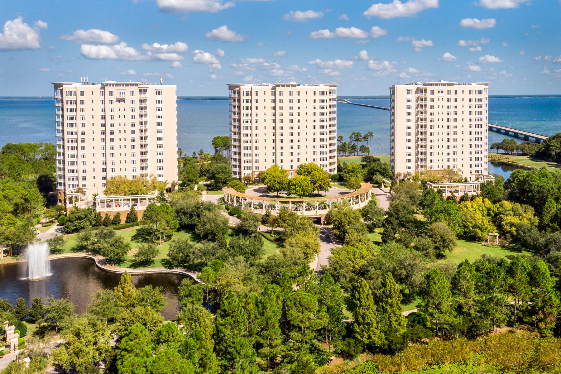 Beautifully updated condominium residence that offers exceptionally private, secured, quiet, and sensible livability! Its expansive floor plan is more indicative of a one-story house than a typical condominium; although, when you depart for travel, you simply turn the key and realize the confidence in a phenomenal onsite management team that is established to watch over your investment in a fabulous lifestyle. Unit 1511 of building 3, the western-most building of the exclusive enclave known as One Water Place, the most extraordinary condominium community within the private gates of Kelly Plantation, yields the most desired floor plan, known as The Castleton, measuring approximately 3,220 square feet, atop the most premier stack, featuring...