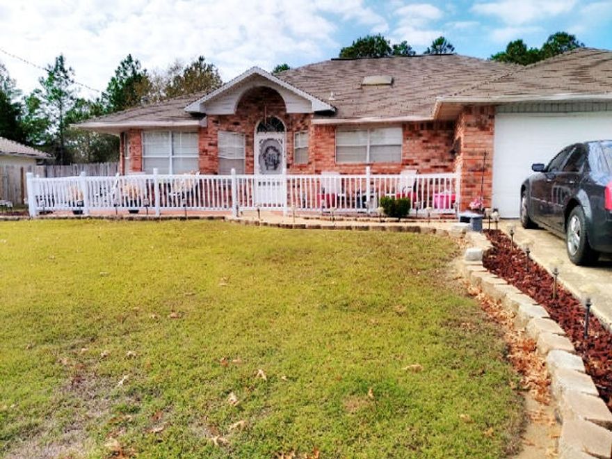 Sellers love shines in this amazing 3 bedroom home. The inviting open front porch to the covered patio and everything in-between. Seller had renovated every room in this home. From the flooring to the unique light fixtures. Your pets are not left out with the state of the art automatic doggie door. Newer appliances, newer AC, New garbage disposal, updated stainless steel appliance, new flooring, new carpet, updated hall vanity and toilet... the list goes on (see feature sheet for all updates). You will not be disappointed with the upgrades or the fully fenced back yard that backs up to the county park. Schedule your private showing today.