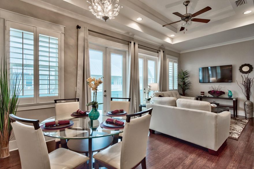 This two-bedroom, two-bathroom townhouse with one-car garage in Prominence along Scenic 30A is being sold fully furnished and rental ready with $45,000 projected gross rental income. The Aruba floor plan has an open living, dining and kitchen area. The dues include exterior maintenance, exterior insurance, and landscaping! Hardwood floors run throughout the living areas and bedrooms. The kitchen has stainless appliances, granite countertops, and a gas cooktop. The living and dining areas open up to a balcony overlooking Prominence. The bedrooms are located at opposite ends of the living area so everyone has privacy but is conveniently located all on one level. The community's town center which is walking distance from this townhome is called The Hub and includes restaurants, shops,