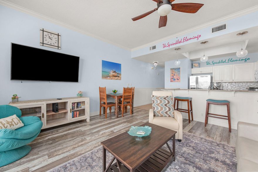 Monthly HOA fees just reduced! Welcome to Waters Edge 613 - A fully-furnished luxurious coastal retreat- Indulge in the ultimate beachfront lifestyle at Okaloosa Island's most sought after community, where elegance meets the serene beauty of the emerald coast. This stunning top-floor condo offers, tile and engineered flooring throughout, washer/dryer, custom wainscotting, 11-foot ceilings and breathtaking panoramic views of the pristine white-sand beaches and emerald green water of Okaloosa Island, one of Florida's premier coastal destinations. With its unparalleled vantage point, you'll have front-row seats to unforgettable scenery. Step onto your private balcony, a tranquil oasis furnished with modern outdoor seating perfect for relaxation while soaking in the stunning vistas of the beach, pool, and lush courtyard. The expansive open-concept living area seamlessly connects to the balcony, creating an inviting space for unwinding after a day in paradise. The large kitchen is a chef's dream, showcasing custom cabinetry, stainless steel appliances, and elegant granite countertops, making it effortless to prepare your favorite culinary delights. Retreat to the primary suite, where luxury meets comfort with a king-sized bed featuring an upgraded Tempur-Pedic cooling memory foam mattress, ensuring a restful night's sleep. Waters Edge 613 is not just a condo; it's a lifestyle. Experience the perfect blend of sophistication, comfort, and amenities in this exquisite beachfront haven. With miles of white sandy beaches to explore, your days will never leave you wanting. Featuring one of the largest freshwater pools on the island, a courtyard grill area, on-site fitness center, and picnic area, there is something for everyone at Waters Edge. Covered parking is a luxury available to all owners/ guests. All of the Island's activities are just minutes away by foot, bicycle or car. Restaurants, watersports, GoKarts, Putt Putt Golf, Pier Fishing, Skylines, and Arcades, are just to name a few. Don't miss your chance to own a piece of paradise!