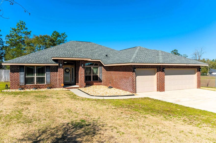 Welcome home! All Brick 4 /3 with 3 car garage situated on a half-acre lot. You are going to want to spend your summer in this gorgeous heated pool with hot tub, sun ledge and waterfall, surrounded by pavers and a 23 x 8 covered lanai, privacy fenced back yard. This split floor plan is well laid out. Kitchen has granite, tiled back splash, stainless steel appliances, breakfast bar and a pantry. Primary suite has 2 closets, 2 vanities, soaking tub and separate shower. New luxury vinyl flooring in kitchen and living areas. Call to schedule a private showing.