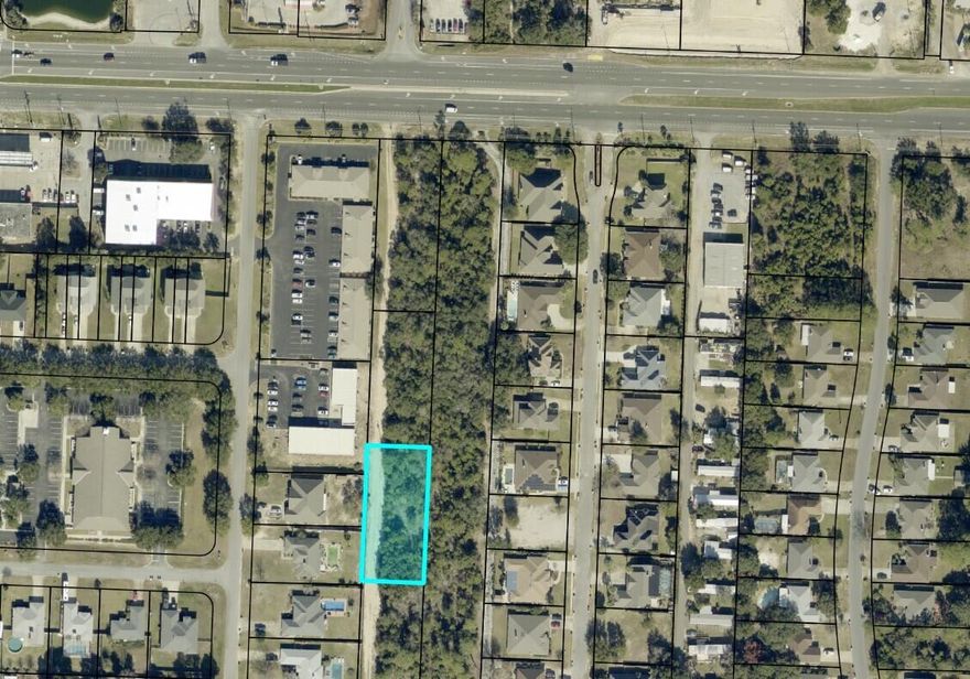 .51 Ac interior lot zoned R1 with Frontage 220. According to GIS map no wetlands are on property , x flood zone, see photos for other pertinent information . Additional .505 acre Lot MLS # 991909 on market for sale as well. Setbacks F25'  R25' S15' soil is Ortega Sand, 0-5% slopes not a Hydric soil. SEPTIC needed water at street and sewer on 98