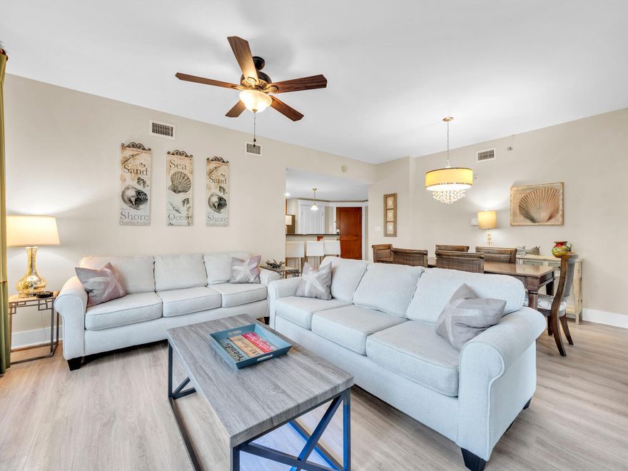 Experience Tranquility in this Elegant 2nd-Floor End UnitThis beautifully decorated 2nd-floor end unit offers a serene retreat with its expansive balcony overlooking the Grand Gardens, The Grand Pool area, and a peek at the picturesque Choctawhatchee Bay. Flooded with natural light, the unit exudes warmth and comfort.The kitchen features ample storage and is complemented by wide-plank luxury vinyl tile flooring, giving the space an updated and stylish appeal. Tile flooring in the kitchen and bathrooms adds practicality and charm. The master suite is a true sanctuary, offering stunning views of the bay. Its en-suite bathroom boasts a double-sink vanity, a relaxing garden tub, and a separate walk-in shower. Enjoy access to a large tropical pool, a kids' pool, a hot tub, and an onsite workout room, perfect for maintaining an active lifestyle. Located just a short stroll from Baytowne Wharf, you'll find endless opportunities for shopping, dining, and activities suitable for all ages.
Discover the perfect blend of luxury, comfort, and convenience in this exceptional Condo.