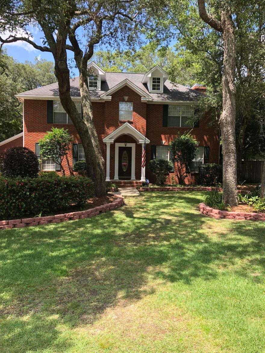 Graceful and welcoming 2-story colonial home on large, shady lot in an established neighborhood in Bluewater Bay calls you to make it your family's home. Stately front entry flanked with columns greets visitors. A detached 2 car garage and beautiful, mature landscaping makes for great curb appeal. The mostly brick, 2-story home with 4 bedrooms and 2.5 baths has separate living room and dining room plus a cozy family room with fireplace for gathering. The kitchen with 2 pantries, a built-in desk and island will be a hub for family activities. A 10 x 14 sunroom brings the outdoors inside and is yet another living space. Notables: Termite bond with Bryan Pest Control. Dual Trane AC units installed 2014. Buyer to confirm all dimensions and other details deemed important. see more...