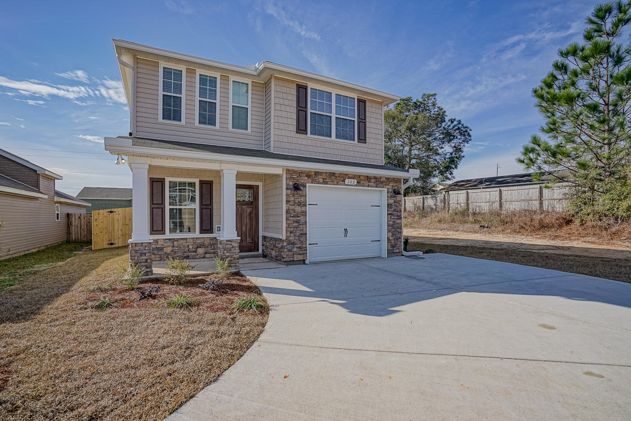 Estimated Closing Date 2/11/22. This cottage style, two story home has a spacious open downstairs floor plan. Kitchen is complete with breakfast bar, pantry, stainless steel appliances all over-looking the Dining area. French doors off the Family room leads you to the privacy-fenced back yard with patio. Upstairs offers a Full Bathroom, Utility room and three spacious bedrooms. The Master suite includes dual vanities, a large walk-in closet, separate shower and garden tub. Decorative Columns, cedar shake vinyl siding and stone exterior accent the exterior of the home. Fully landscaped yard with sod in front back and sides. Actual colors may vary. Pictures are from a previously built home. Plans and Specifications subject to change without notice. See more comments for color selection.