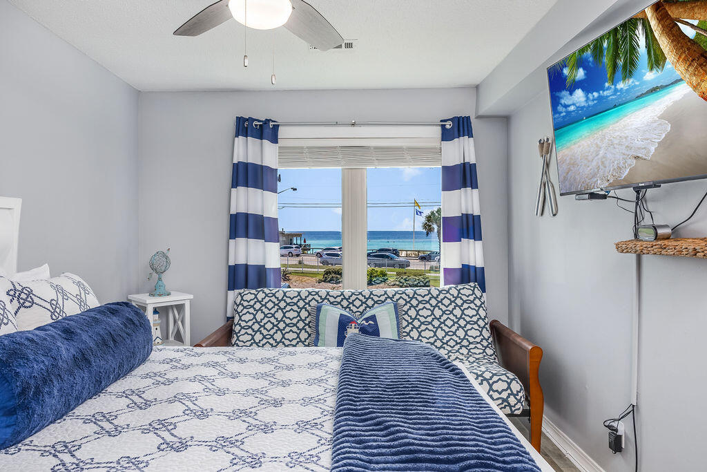Location...Location...View...View...View...with $85,000 in upgrades too!! Directly across from the White Sand Beach & Emerald Green Waters of the Gulf. Click on the photos to discover the ''Best Location'' in Seascape with the gulf on one side, a beautiful pool on the other, and easy access to the ever popular ''Whales Tail'' for casual dining & refreshments. The unit's extensive improvements & furniture upgrades create a very comfortable ''Coastal Casual'' feel. In addition, the exterior of the building as well has received a new roof, stairwells & handrails with the assessments being paid for already. The condo is not only perfect for permanent living but will also perform very well as a Vacation Rental. If you like the location, the upgrades and the view then this is the condo for you.