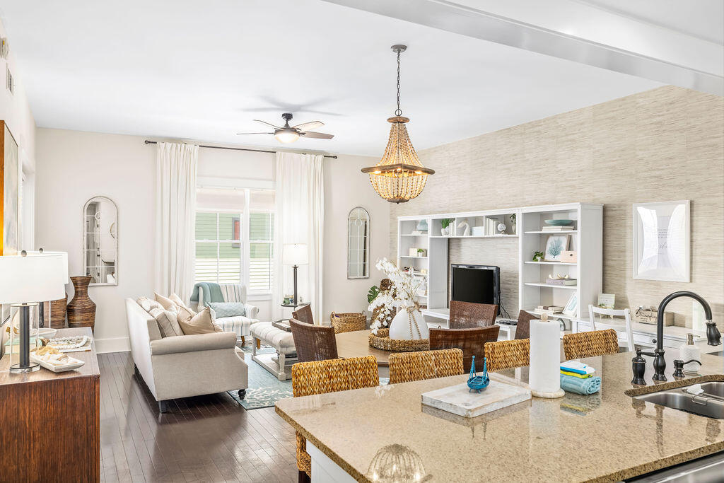 Incredible 3 bedroom 3 bathroom unit in the highly sought-after community of Blue Mountain Beach. Unit M2-316 is located in Redfish Village and is being sold mostly furnished and rental ready. The condo features hardwood flooring throughout and granite countertops in the bathrooms and kitchen. The kitchen is fully equipped with stainless steel appliances and bar seating. The unit has a spacious outdoor balcony that can be accessed from the living room and the master bedroom and views of the pool and courtyard from the front door. Private beach access is a short stroll away and Redfish Taco, the onsite restaurant, can be enjoyed for lunch and dinner with live music. Situated in the heart of Blue Mountain Beach, Redfish Village is steps away from shopping, dining, entertainment and the sugar