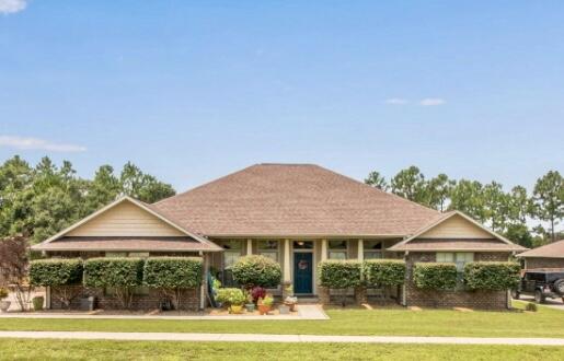 PRICE ADJUSTMENT AND 10k SELLERS CREDIT w/ acceptable offer!! Welcome to this exceptional 4 bedroom, 3 bathroom home nestled on a spacious half-acre lot. This custom built home not only offers ample living space but also boasts desirable features such as an office, a covered back patio, and 1 of the 3 additional bedrooms doubling as a second primary suite complete with it's own patio access and bathroom.Step inside and be greeted by a warm and inviting atmosphere. The open-concept layout seamlessly connects the living room, breakfast room, and kitchen, providing an excellent space for entertaining family and friends. The kitchen features stainless steel appliances, island , ample counter space and walk in pantry.