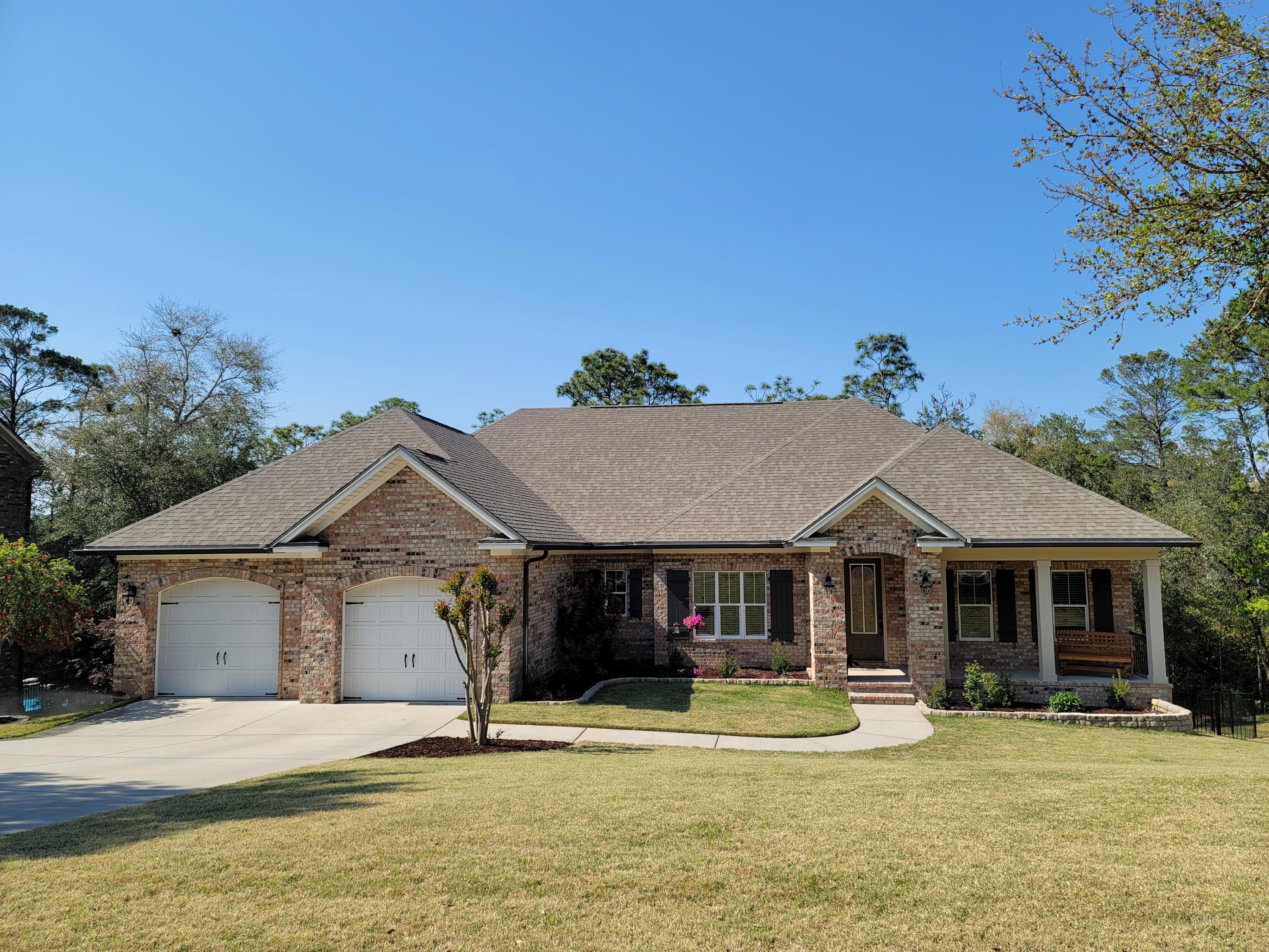 Elegant and roomy home in highly desirable Swift Creek Plantation. Step inside to a spacious living area with 10 foot ceilings, custom crown molding and recessed lighting.  Beautiful flooring throughout the home. Kitchen provides plenty of beautiful cabinetry with soft close hinges, granite countertops, tile backsplash, gas stove & large walk-in pantry. Spacious master suite is located on the first floor and features large master bathroom with large closet, double vanity, soaker tub and separate walk in shower. 2nd and 3rd bedrooms on first floor share a jack and jill bathroom. Downstairs is the fully finished basement complete with two additional bedrooms, two more bathrooms, lots of storage space, hearth room, full kitchen and HUGE family rec room. There's a safe room with keypad access.