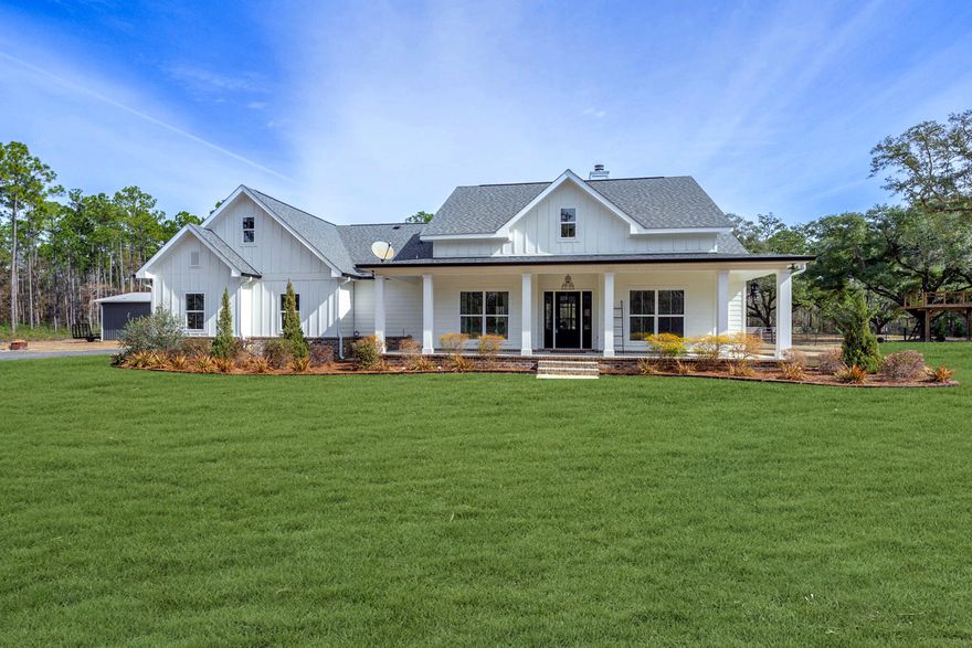Nestled on a sprawling 9+ acre corner lot, this beautiful 3 bedroom, 2.5 bath home offers a peaceful retreat with modern amenities and plenty of space to roam. With a gated entrance, this property provides both privacy and security. Built in 2018, the home features a bright, open-concept design with an abundance of windows that flood the space with natural light. The heart of the home is the spacious kitchen, complete with a large island and breakfast bar, stunning quartz countertops, a farmhouse sink, and a large walk-in pantry. The adjoining dining nook offers a cozy spot for family meals, while the open living area provides a seamless flow for entertaining. The primary bedroom is a private sanctuary, tucked away on one side of the home with French doors leading directly to the backyard , and you'll be surrounded by mature live oaks, providing shade and beauty, along with a charming tree house that's perfect for kids or just enjoying nature from above. The outdoor space includes a covered open patio for relaxing or entertaining, as well as a screened-in patio. Beyond the house, the property offers even more versatility with a large metal building that's perfect for storing a boat or RV, as well as a 2-car garage and an oversized utility room. This home offers the perfect blend of modern living, ample space, and serene country surroundingsdon't miss your chance to own this exceptional property!