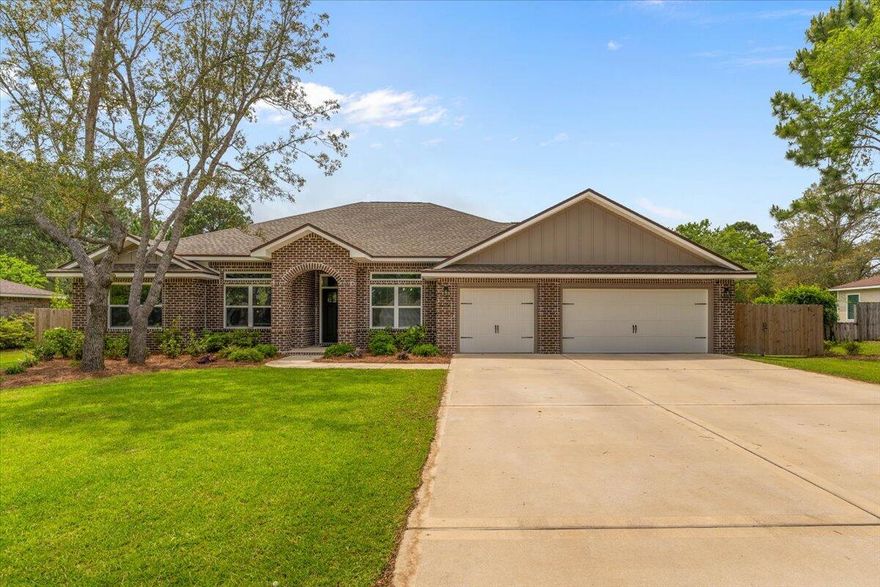 Welcome to 2029 Everglades Drive--a meticulously maintained, like-new home built in 2023 by renowned local builder Robbins Builders, known for their craftsmanship and high-quality finishes. Just minutes from the beautiful beaches and nestled in the highly desirable Holley by the Sea community, this 4-bedroom, 3-bathroom home offers 2,470 square feet of thoughtfully designed living space on a spacious half-acre lot. Inside, you'll find a bright, open layout with upscale fixtures, stylish finishes, and elevated craftsmanship throughout. The main living area flows effortlessly into a generous dining space and a beautifully appointed kitchen featuring modern cabinetry, ample storage, and sleek surfaces--ideal for both everyday living and entertaining. The split-bedroom floor plan offers privacy and function, with a luxurious primary suite featuring a spa-like en suite bath, and three additional bedrooms served by two full guest baths.  Out back, a new fence (2024) encloses a large backyard with a dedicated gate for boat or RV parking - a unique and practical feature that aligns with HOA guidelines.  As a Holley by the Sea resident, enjoy access to a top-tier amenity center offering multiple pools, tennis courts, a fitness center, beachfront park, and more.  Learn more at holleybythesea.org.  Perfect for anyone, this move-in-ready home blends modern comfort, luxury touches, and laid-back coastal livingall just minutes from the sugar-white beaches of Navarre.  Don't miss your chance to own this exceptional property in one of Navarre's most sought-after communities!