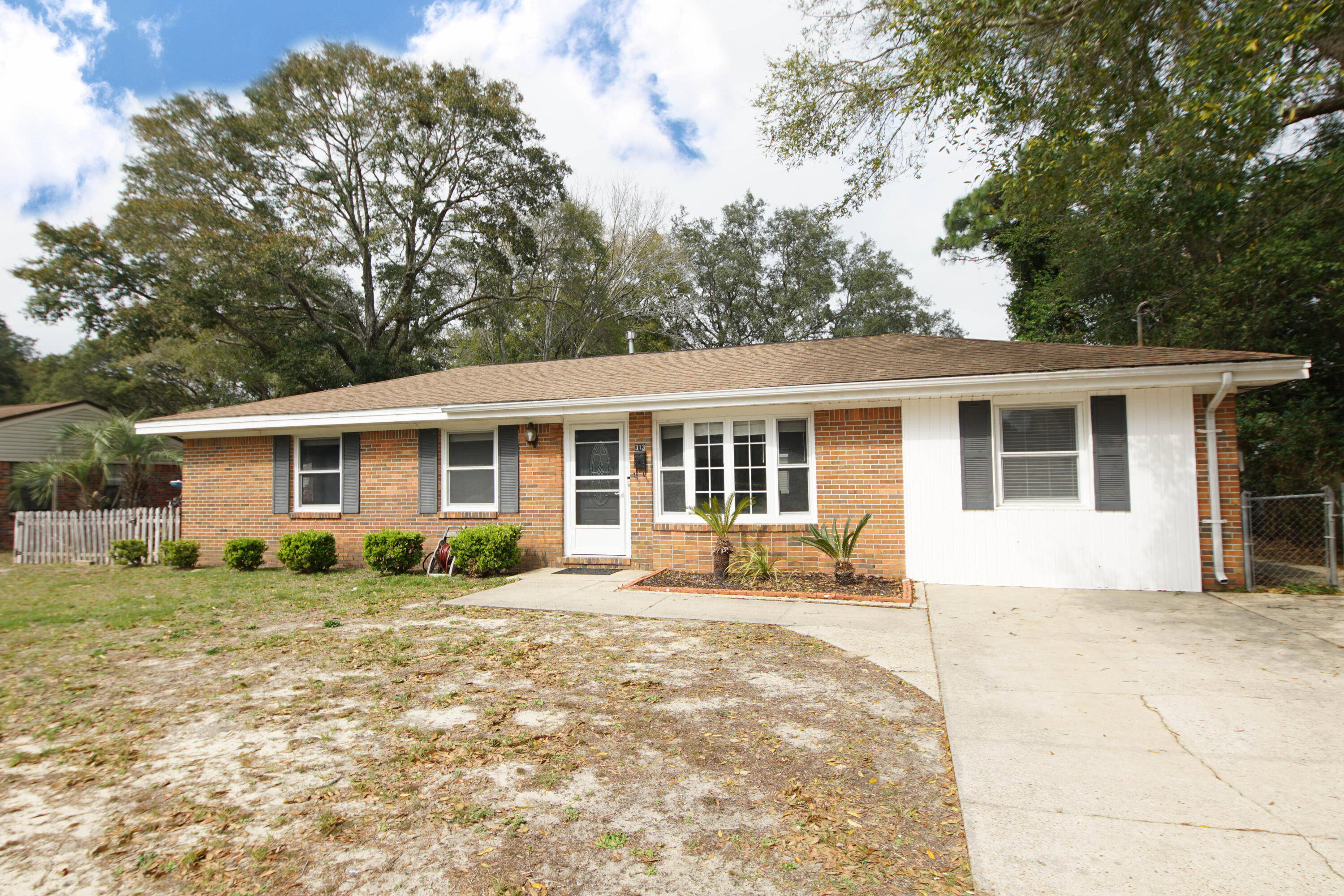 Updated home in Niceville with a POOL , workshop and shed! Inside there are 4 bedrooms ,1 full bathroom, a half bath in the master, living room, remodeled kitchen and laundry room. No carpets, vinyl plank and tile throughout. Tankless water heater. Kitchen has new white cabinets, stainless appliances and butcher block counters. Outside is an inground saltwater pool ( pool service is included in the rent), large fenced back yard a workshop and a shed. Dogs may be allowed with owner approval and a non refundable pet fee. No smoking property. All applicants 18 years or older must fill out and application @ www.nicevillerentals.com.