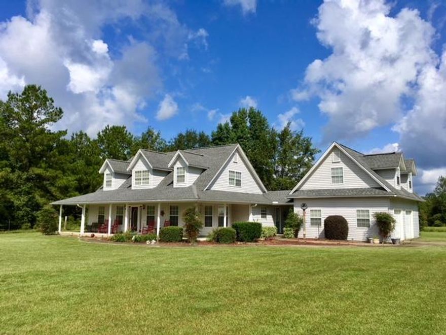AMAZING HOUSE & 14 ACRES!
BRAND NEW ROOF just installed with transferrable warranty. 4 BR 2.5BA home on 14 acres of pasture, but only 15 minutes to DeFuniak and just 40 minutes to the Beach. Perfect for horses, the property has a 40x24' pole barn, and a 1.5 acre stocked pond w/ floating dock. The house features new porcelain tile & hardwood floors, crown molding, and an open floor plan. Spacious kitchen with island and new KitchenAid stainless appliances w/ transferrable extended warranties. Newer water heater & HVAC. New sinks, toilets, faucets, granite countertops. Master bedroom is on the main floor, and there's a bonus room over the 2-car garage (w/ auto garage door openers). Internet and 5 gen wifi is available. This house has everything you are looking for and is priced to sell.