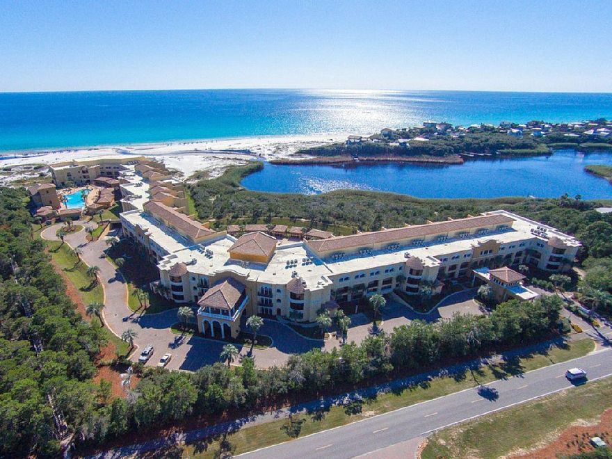 Must see in Prestigious Sanctuary by the Sea! Gulf views from the balcony, master bedroom, living room, and kitchen. The residence includes 10ft. ceilings, 8ft. doors, crown molding and base molding, Viking Professional Stainless Steel appliances, granite counter tops throughout, 18'' travertine tile floors, custom solid birch wood cabinets, gas fireplace, wet bar with Viking ice maker and wine refrigerator, master bathroom whirlpool tub, separate tiled shower, and granite top double vanity! This luxury residence offers anover-sized balcony that has Gulf views, lake views, and/or pool views. Sanctuary by the Sea sits on 23 acres with only 82 residences. The property is bordered to the south by approximately 650' on the Gulf and Big Redfish Lake