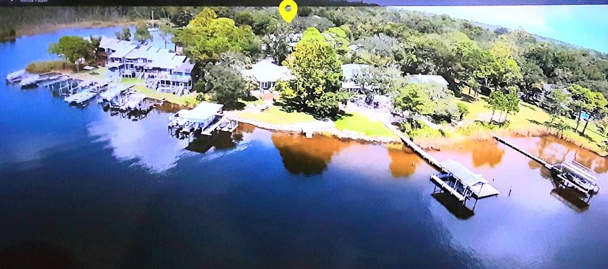 Great News! REMODELED!!! WATERVIEW 2 bed/ 2 bath END UNIT! FRESHLY PAINTED, NEW QUARTZ COUNTERTOPS. New paint New gutters. New blinds. Deckings and a substantial portion of the siding has been replaced. Located in the heart of Niceville, FL. NEW ROOF 2022! COMMUNITY DOCK! Exclusive dock available for renting. Easy access to deep water!! Picnic table. Firepit. Gazebo, great for relaxing reading your favorite book or admiring the breath taking sunsets. Plenty of storage inside the unit and the storage shed. Only 12 minutes from Eglin Airforce Base. 20 minutes from one of the world's most beautiful beaches. Close to 77th Special Forces and Duke Field. Several porches.