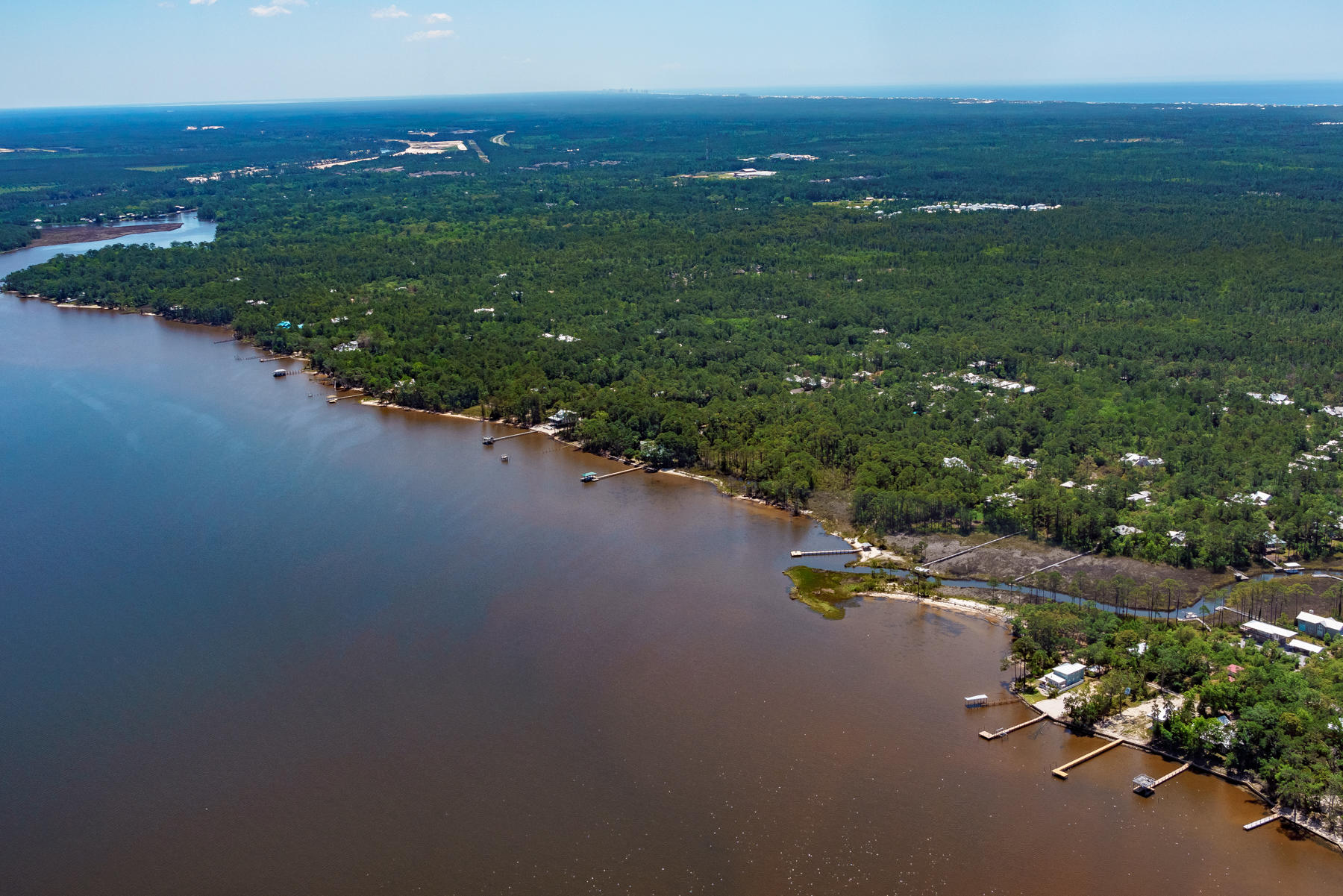 ~PRICE REDUCED~ Imagine building your dream home mere steps from the Choctawhatchee Bay... 2 lots make up nearly a quarter of an acre, being sold together or separately. The unspoiled landscape provides a natural setting while offering the potential for Bay views with a home designed to make the best of this premium location. Quiet Water Trail is a peaceful, secluded setting with a boat ramp within walking distance. Take your dogs for a swim, or drop your boat or paddle board and quickly enjoy the bay lifestyle. Point Washington is only a 5 minute drive to Scenic Hwy 30A, and also provides convenient access to Miramar Beach, Destin, as well as Panama City Beach. SURVEY AVAILABLE.